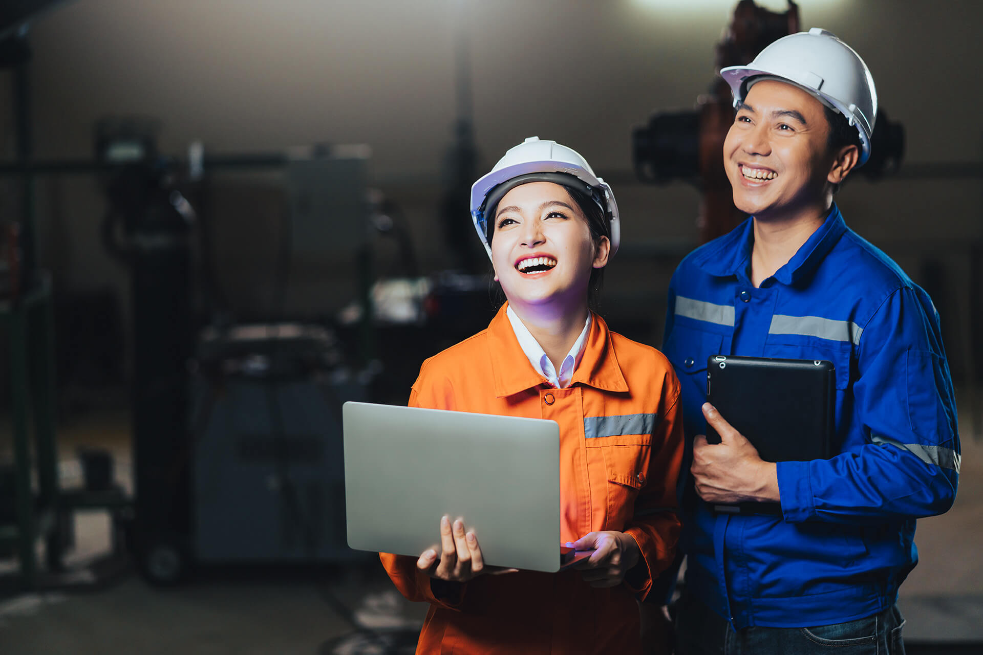 asian engineers in safety uniform